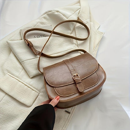 Evelyn | Compact and stylish — Leather Saddle Bag